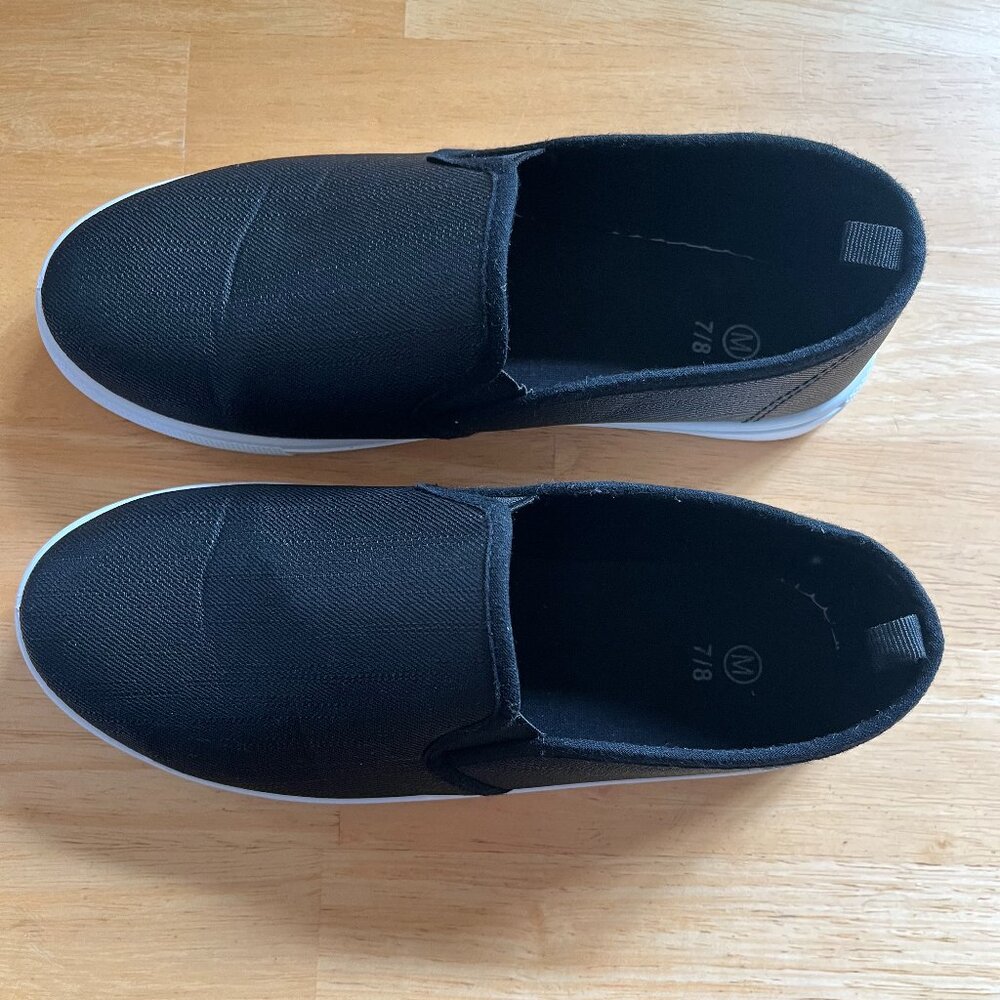 Womans Black Slip on Canvas Shoe. Size 7/8 Medium. Like New.